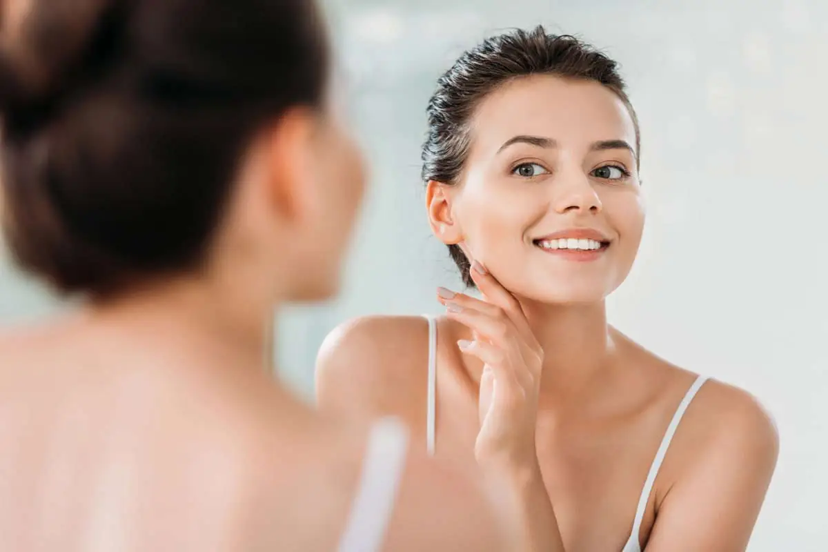 woman happy with the results of her dental appointment at Pettey Dental of Bartlett