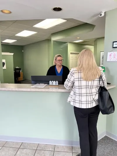 woman scheduling her dental appointment at Pettey Dental of Bartlett