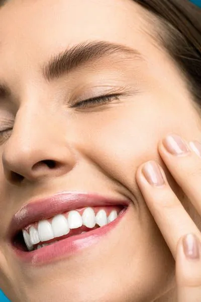 woman loving the look and feel of her skin